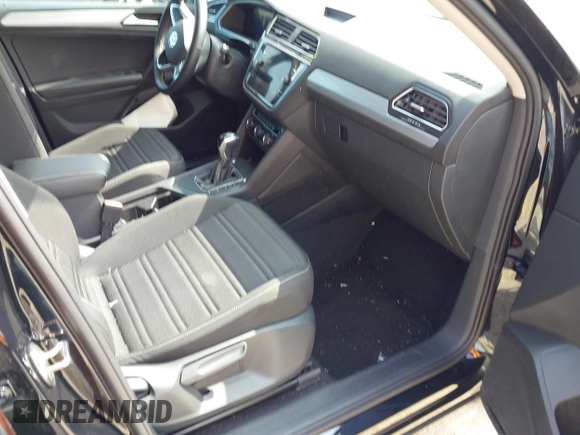 2024 Volkswagen Tiguan S with VIN 3VVRB7AX4RM201384, listed as a IAAI auction lot 42401212 with 11,986 mi miles and . Bid and sale history available at DreamBid. Image 5.