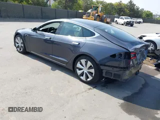 2020 Tesla Model S Long Range with VIN 5YJSA1E24LF415849, listed as a IAAI auction lot 42571945 with 34,398 mi miles and . Bid and sale history available at DreamBid. Image 3.