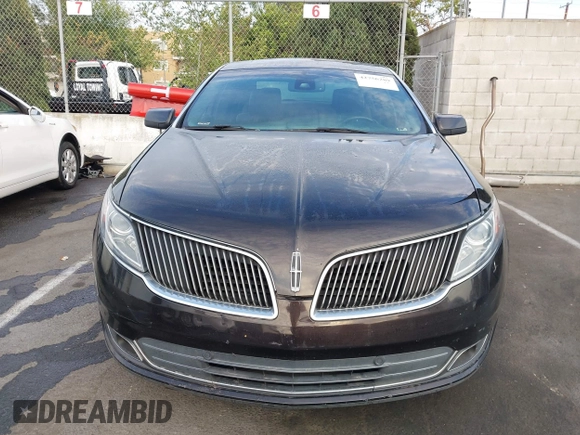2013 Lincoln MKS with VIN 1LNHL9DK6DG608673, listed as a IAAI auction lot 42756289 with 103,118 mi miles and . Bid and sale history available at DreamBid. Image 12.