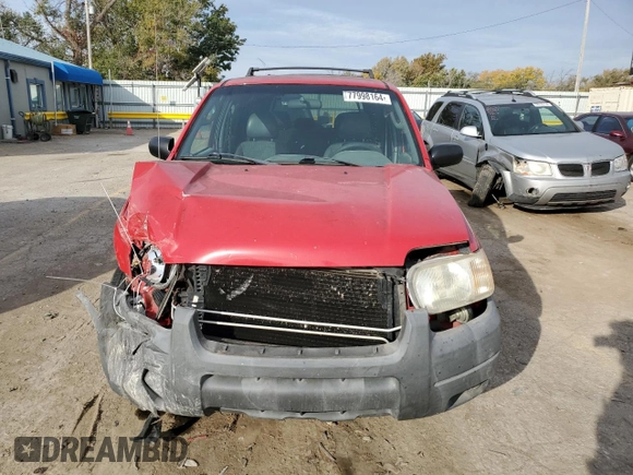 2002 Ford Escape XLS Value with VIN 1FMYU01B82KC15443, listed as a Copart auction lot 77998164 with 212,313 mi miles and Salvage title. Bid and sale history available at DreamBid. Image 5.
