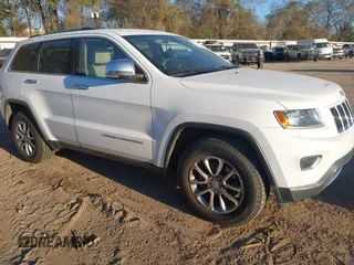 2014 Jeep Grand Cherokee Limited with VIN 1C4RJEBG9EC414265, listed as a IAAI auction lot 41843360 with 118,767 mi miles and . Bid and sale history available at DreamBid. Image 1.