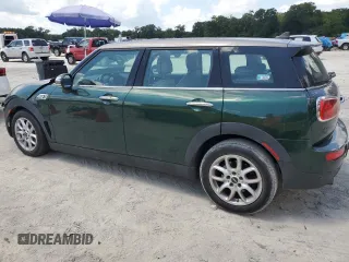 2016 MINI Clubman z VIN WMWLN5C5XG2E29275, wystawiony jako Copart lot #68162014 z przebiegiem 79 754 mil mil oraz Nie do naprawy. Historia ofert i sprzedaży dostępna na DreamBid. Obrazek 2.