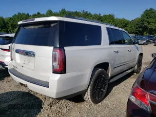 2016 GMC Yukon XL Denali with VIN 1GKS2HKJXGR421600, listed as a Copart auction lot 66868064 with 159,013 mi miles and Salvage Title. Bid and sale history available at carsss.com. Image 3.