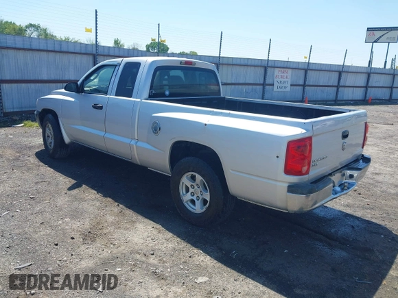 2005 Dodge Dakota SLT with VIN 1D7HE42K95S337682, listed as a IAAI auction lot 41905755 with 145,095 mi miles and . Bid and sale history available at carsss.com. Image 3.