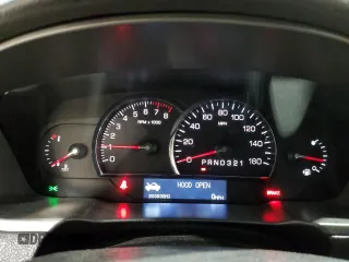 2010 Cadillac DTS 1SC z VIN 1G6KD5EY7AU128077, wystawiony jako Copart lot #58089475 z przebiegiem 203 830 mil mil oraz Szkody całkowita. Historia ofert i sprzedaży dostępna na DreamBid. Obrazek 9.
