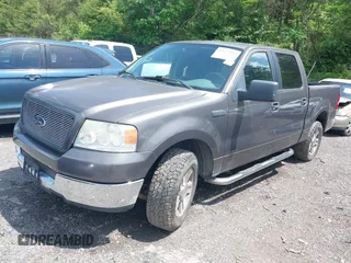 2005 Ford F-150 XLT with VIN 1FTPW12515KE80153, listed as a IAAI auction lot 42057009 with 135,454 mi miles. Bid and sale history available at carsss.com. Image 2.