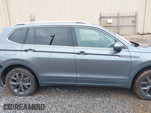 2023 Volkswagen Tiguan SE with VIN 3VVNB7AX4PM042409, listed as a IAAI auction lot 42627800 with 29,016 mi miles and . Bid and sale history available at DreamBid. Image 13.