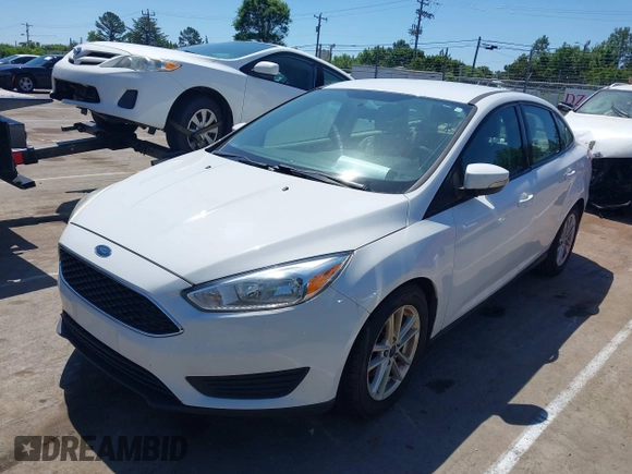 2017 Ford Focus SE with VIN 1FADP3F29HL234323, listed as a IAAI auction lot 42143821 with 138,860 mi miles. Bid and sale history available at carsss.com. Image 2.