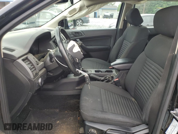 2020 Ford Ranger XL with VIN 1FTER4FH0LLA78569, listed as a Copart auction lot 57336735 with 52,196 mi miles and Salvage title. Bid and sale history available at DreamBid. Image 7.
