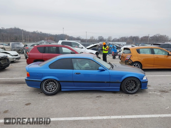 1999 BMW 3 Series M3 with VIN WBSBG9336XEY80979, listed as a IAAI auction lot 41179676 with 262,233 mi miles. Bid and sale history available at carsss.com. Image 13.