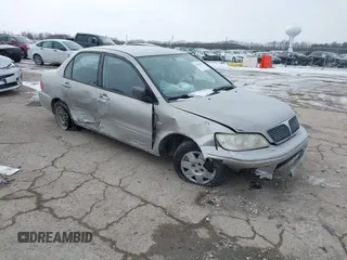 2002 Mitsubishi Lancer ES with VIN JA3AJ26E62U043039, listed as a IAAI auction lot 41600217 with 141,217 mi miles. Bid and sale history available at carsss.com. Image 1.