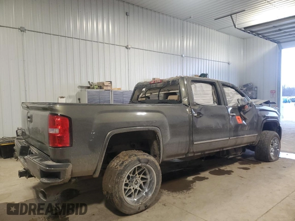 2018 GMC Sierra 2500HD Denali z VIN 1GT12UEY9JF121158, wystawiony jako Copart lot #87449504 z przebiegiem 170 506 mil mil oraz Szkoda całkowita • Salvage title. Historia ofert i sprzedaży dostępna na DreamBid. Obrazek 3.