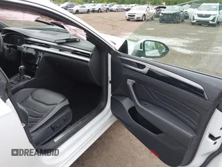 2021 Volkswagen Arteon SEL R-Line z VIN WVWSR7AN6ME007156, wystawiony jako IAAI lot #42254735 z przebiegiem 32 004 mil mil oraz . Historia ofert i sprzedaży dostępna na DreamBid. Obrazek 5.