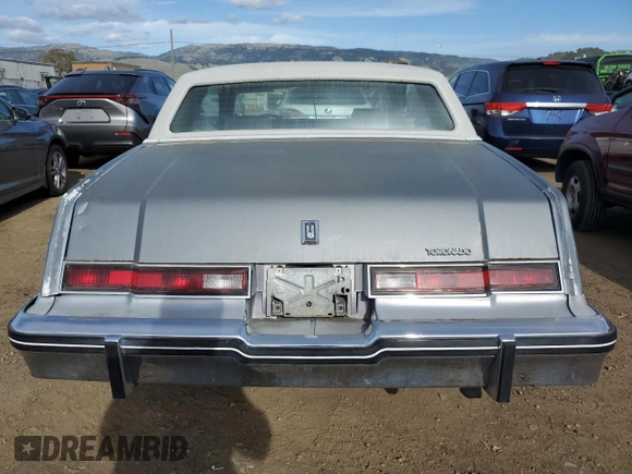 1982 Oldsmobile Toronado with VIN 1G3AZ57Y5CE325589, listed as a Copart auction lot 47707135 with 99,044 mi miles and Clean Title. Bid and sale history available at DreamBid. Image 6.