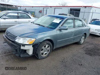 2002 Toyota Avalon XL with VIN 4T1BF28B72U211213, listed as a IAAI auction lot 41717347 with 215,979 mi miles and . Bid and sale history available at DreamBid. Image 2.