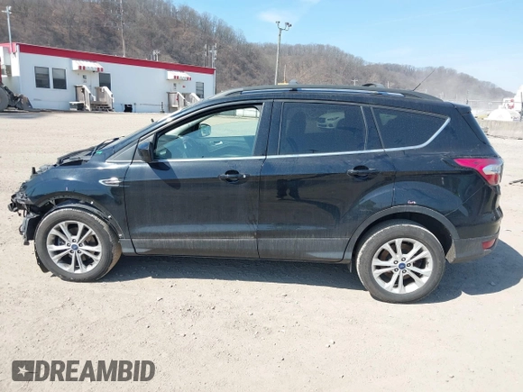 2017 Ford Escape SE with VIN 1FMCU9G98HUB94481, listed as a IAAI auction lot 41795259 with 114,209 mi miles. Bid and sale history available at carsss.com. Image 14.