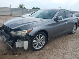 2014 Infiniti Q50 Premium with VIN JN1BV7APXEM681978, listed as a IAAI auction lot 42681718 with 138,857 mi miles and . Bid and sale history available at DreamBid. Image 2.