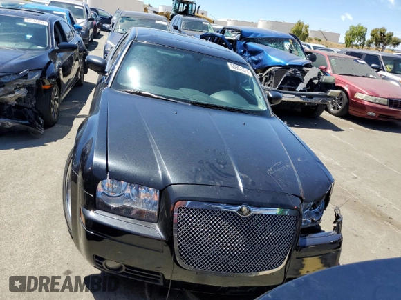 2005 Chrysler 300 with VIN 2C3JA43R95H161005, listed as a Copart auction lot 60951874 with 147,903 mi miles and Salvage Title. Bid and sale history available at carsss.com. Image 5.
