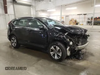 2017 Honda CR-V LX with VIN 5J6RW6H38HL004499, listed as a Copart auction lot 52412155 with 134,715 mi miles and Salvage Title. Bid and sale history available at DreamBid. Image 4.