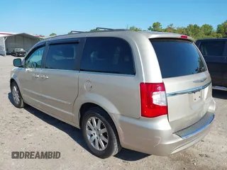 2014 Chrysler Town & Country Touring with VIN 2C4RC1BG4ER372629, listed as a IAAI auction lot 42060762 with 180,662 mi miles. Bid and sale history available at carsss.com. Image 3.