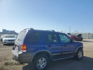 2006 Ford Escape XLT with VIN 1FMYU93136KA51162, listed as a Copart auction lot 52239385 with 227,666 mi miles and Salvage title. Bid and sale history available at DreamBid. Image 3.