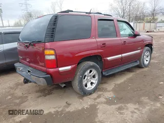 2001 GMC Yukon SLT with VIN 1GKEK13T71J198393, listed as a IAAI auction lot 41898293 with 230,055 mi miles. Bid and sale history available at carsss.com. Image 4.