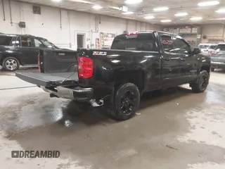 2015 Chevrolet Silverado 1500 LT with VIN 1GCVKREC2FZ417244, listed as a IAAI auction lot 41267554 with 87,735 mi miles and . Bid and sale history available at DreamBid. Image 4.