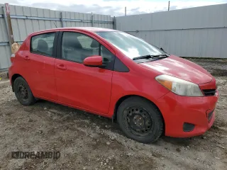 2012 Toyota Yaris L with VIN JTDKTUD32CD517695, listed as a Copart auction lot 57392355 with 201,711 mi miles and Salvage title. Bid and sale history available at DreamBid. Image 4.