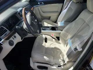 2009 Lincoln MKS z VIN 1LNHM94R89G601127, wystawiony jako Copart lot #60551075 z przebiegiem 102 000 mil mil oraz Szkoda całkowita • Salvage title. Historia ofert i sprzedaży dostępna na DreamBid. Obrazek 7.