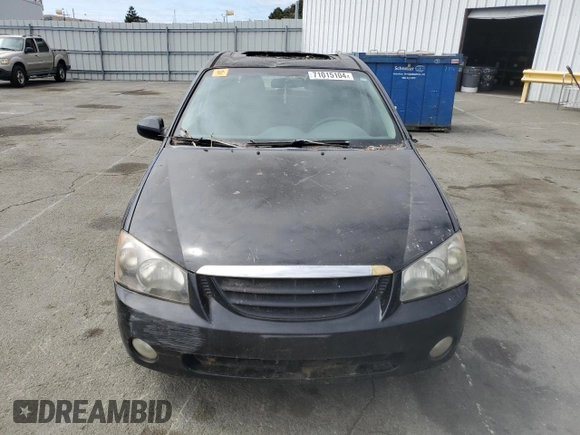 2005 Kia Spectra with VIN KNAFE162655074198, listed as a Copart auction lot 71015104 with 200,819 mi miles and Salvage Title. Bid and sale history available at DreamBid. Image 5.