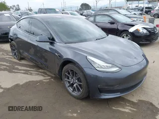 2018 Tesla Model 3 Long Range Battery with VIN 5YJ3E1EA0JF101564, listed as a IAAI auction lot 41902214 with 101,581 mi miles. Bid and sale history available at carsss.com. Image 1.