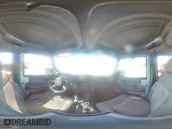 2010 Jeep Wrangler Unlimited Rubicon with VIN 1J4BA6H12AL107485, listed as a Copart auction lot 48802825 with 123,299 mi miles and Salvage title. Bid and sale history available at DreamBid. Image 14.