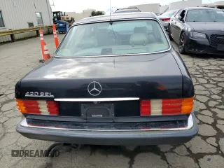 1990 Mercedes-Benz 420 with VIN WDBCA35E8LA539818, listed as a Copart auction lot 45764444 with 219,036 mi miles and Salvage Title. Bid and sale history available at carsss.com. Image 6.