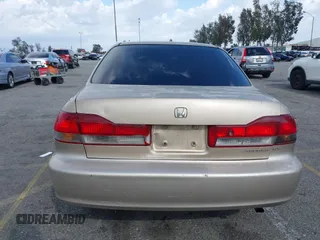 2001 Honda Accord EX z VIN 1HGCG66821A084618, wystawiony jako IAAI lot #41959020 z przebiegiem 272 671 mil mil oraz . Historia ofert i sprzedaży dostępna na DreamBid. Obrazek 16.