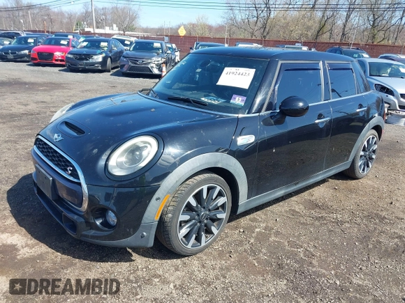 2017 MINI Hardtop 4 Door Cooper S z VIN WMWXU3C39H2F48699, wystawiony jako IAAI lot #41924423 z przebiegiem 81 249 mil mil oraz . Historia ofert i sprzedaży dostępna na DreamBid. Obrazek 19.