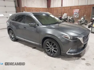 2016 Mazda CX-9 Signature with VIN JM3TCBEY7G0120460, listed as a IAAI auction lot 41913584 with 114,901 mi miles and . Bid and sale history available at carsss.com. Image 1.