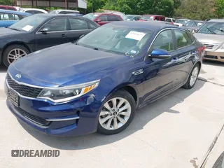 2016 Kia Optima LX with VIN 5XXGT4L30GG073039, listed as a IAAI auction lot 42055627 with Not Provided miles and . Bid and sale history available at carsss.com. Image 2.