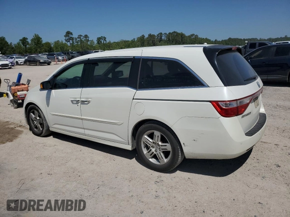 2013 Honda Odyssey Touring with VIN 5FNRL5H94DB021388, listed as a Copart auction lot 52582775 with 141,566 mi miles and Salvage Title. Bid and sale history available at carsss.com. Image 2.