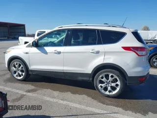 2013 Ford Escape Titanium with VIN 1FMCU0J96DUA71857, listed as a IAAI auction lot 41877003 with 118,864 mi miles and . Bid and sale history available at carsss.com. Image 14.