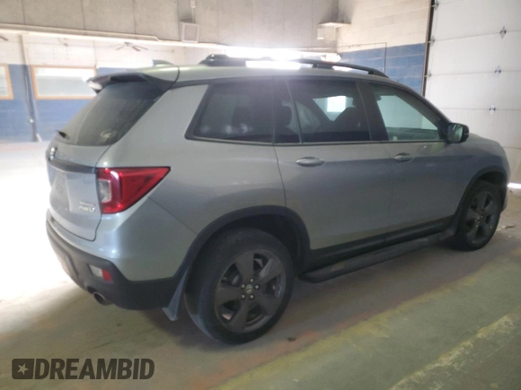 2021 Honda Passport Touring with VIN 5FNYF8H93MB010192, listed as a Copart auction lot 83013954 with Not Provided miles and Salvage Title. Bid and sale history available at carsss.com. Image 3.