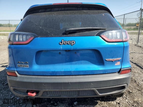 2019 Jeep Cherokee Trailhawk with VIN 1C4PJMBX9KD393862, listed as a Copart auction lot 56695905 with 64,334 mi miles and Salvage title. Bid and sale history available at DreamBid. Image 6.