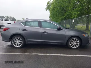 2020 Acura ILX z VIN 19UDE2F36LA000066, wystawiony jako IAAI lot #42495584 z przebiegiem 27 763 mil mil oraz . Historia ofert i sprzedaży dostępna na DreamBid. Obrazek 13.