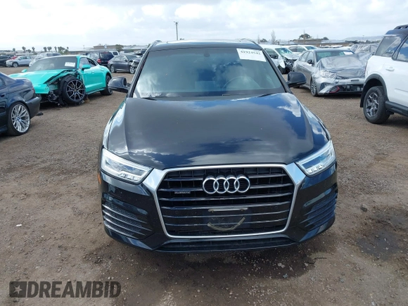 2016 Audi Q3 Prestige with VIN WA1GFCFS8GR003333, listed as a IAAI auction lot 41924542 with 116,360 mi miles. Bid and sale history available at carsss.com. Image 12.