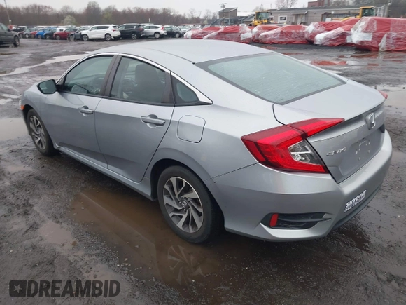 2016 Honda Civic EX with VIN 19XFC2F75GE217935, listed as a IAAI auction lot 41963307 with 87,477 mi miles and . Bid and sale history available at DreamBid. Image 3.