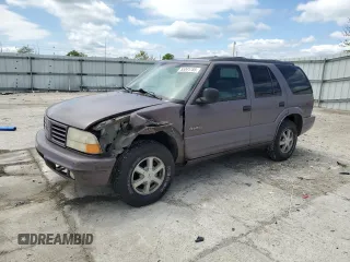 1998 Oldsmobile Bravada z VIN 1GHDT13W9W2718457, wystawiony jako Copart lot #55341755 z przebiegiem 133 968 mil mil oraz Tytuł czysty. Historia ofert i sprzedaży dostępna na DreamBid. Obrazek 1.