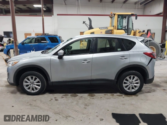 2016 Mazda CX-5 Sport with VIN JM3KE2BY2G0718434, listed as a IAAI auction lot 41961364 with 145,748 mi miles. Bid and sale history available at carsss.com. Image 14.