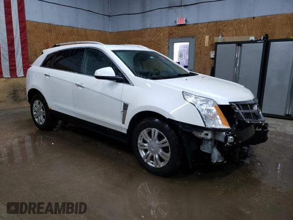 2012 Cadillac SRX Luxury Collection with VIN 3GYFNAE35CS596878, listed as a Copart auction lot 50736725 with 130,007 mi miles and Clean Title. Bid and sale history available at DreamBid. Image 4.