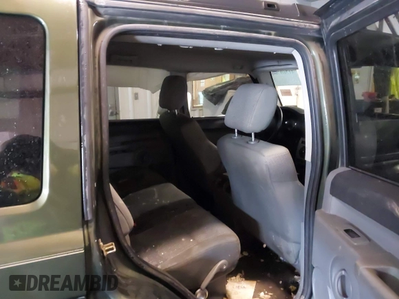 2007 Jeep Commander Sport z VIN 1J8HG48P17C545682, wystawiony jako IAAI lot #41369706 z przebiegiem 187 900 mil mil oraz . Historia ofert i sprzedaży dostępna na DreamBid. Obrazek 8.