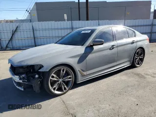 2020 BMW 5 Series M550i xDrive z VIN WBAJS7C07LCD45449, wystawiony jako Copart lot #77183744 z przebiegiem 44 445 mil mil oraz Szkoda całkowita • Salvage title. Historia ofert i sprzedaży dostępna na DreamBid. Obrazek 1.