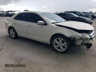 2012 Ford Fusion SE z VIN 3FAHP0HA3CR194075, wystawiony jako Copart lot #63380895 z przebiegiem 176 634 mil mil oraz Szkoda całkowita • Salvage title. Historia ofert i sprzedaży dostępna na DreamBid. Obrazek 4.
